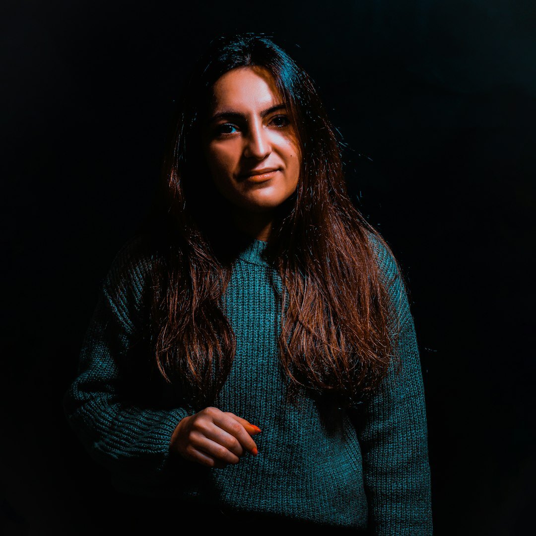 Portrait of a smiling woman, broadcast producer