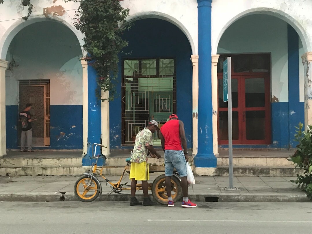 Journalist interviewing a resident on a local street