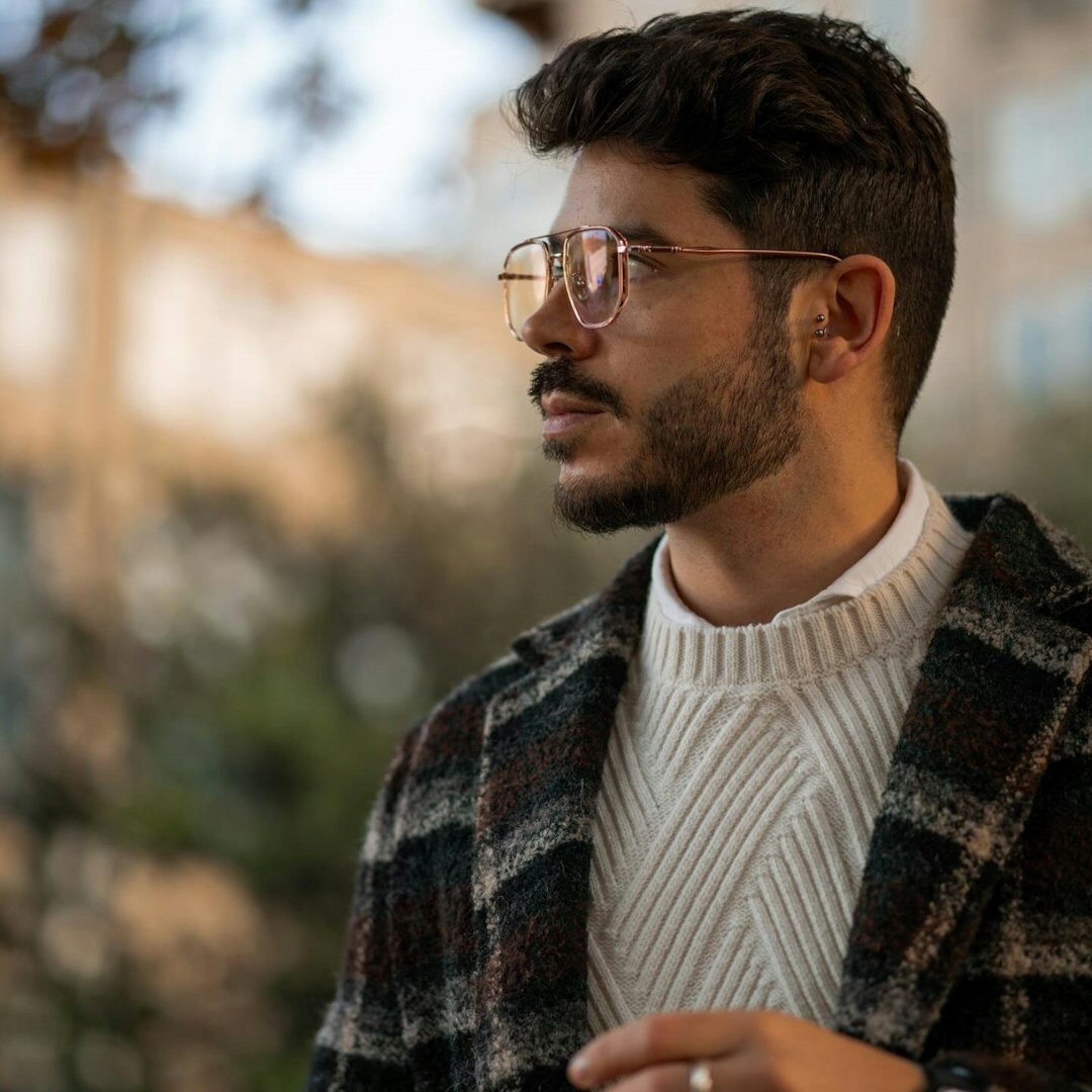 Portrait of a bearded man in glasses, course director